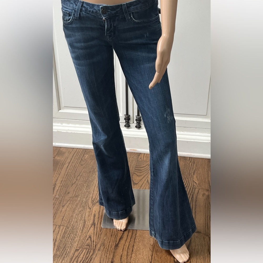 Hudson Low rise bell bottoms dark wash with some distressing. Mild wear